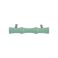 Mint green bamboo-style turned wood bar pull, side view