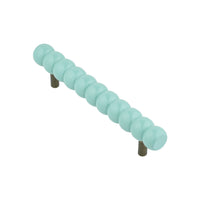 Compact turquoise beaded bar pull, angled view