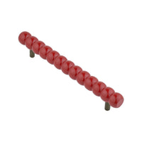Long cherry red beaded bar pull, angled view