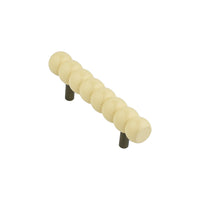 Compact ivory cream beaded bar pull, angled view