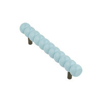 Long powder blue beaded bar pull, angled view