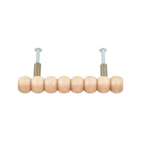 Compact natural wood beaded bar pull, side view