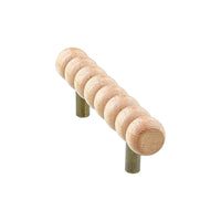 Compact natural wood beaded bar pull, angled view